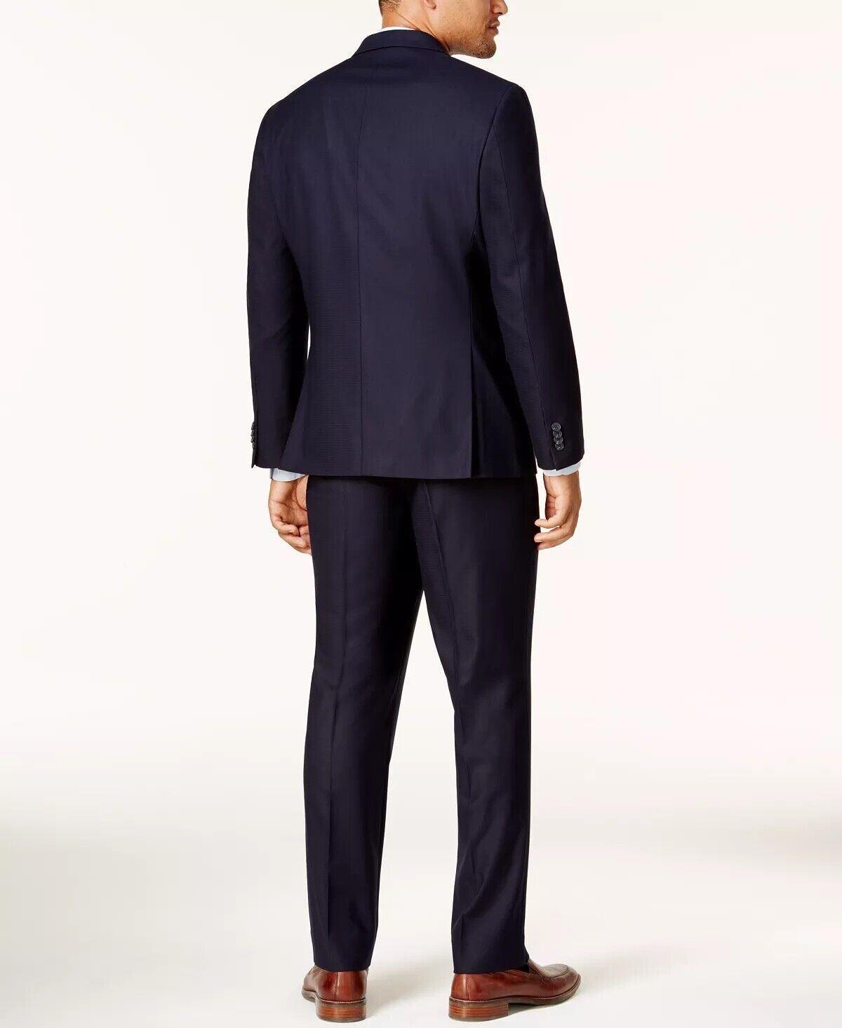 Kenneth Cole Mens Slim fit 2 Piece Suit 42 R / 35 Waist Navy Blue Solid